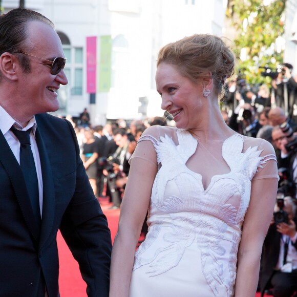 Quentin Tarantino et Uma Thurman - Montée des marches du film "Pour une poignée de dollars" pour la cérémonie de clôture du 67e Festival du film de Cannes le 24 mai 2014