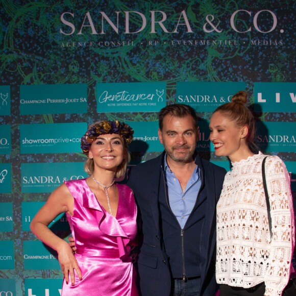 Laetitia Mendes, Clovis Cornillac et Lilou Fogli - Dans le cadre du 6e jour du 71e Festival de Cannes, la Suite Sandra & Co a dédié sa soirée à l'association Geneticancer, première et unique association de lutte contre les cancers génétiques et/ou d'origine héréditaire, créée en janvier 2016 par Laetitia Mendes. Le 13 mai 2018