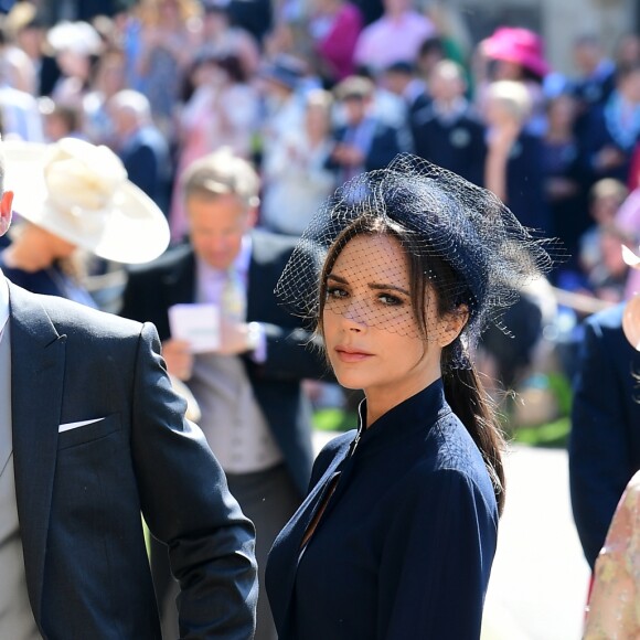 David Beckham et sa femme Victoria arrivent à la chapelle St George pour le mariage du prince Harry et de Meghan Markle au château de Windsor, Royaume Uni, le 19 mai 2018.