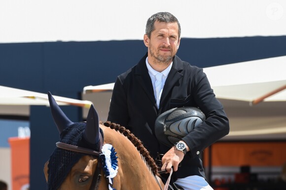 Guillaume Canet troisième sur le podium du PRIZE FERRETTI YACHTS - Pour la cinquième année consécutive, le Longines Athina Onassis Horse Show ("LAOHS"), s'installe sur la mythique plage de Pampelonne, située sur la Presqu'île de Saint-Tropez. Cet évènement d'exception est orchestré par la célèbre cavalière Athina Onassis. Le 31 mai 2018. © Lionel Urman / Bestimage