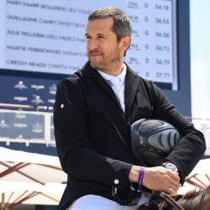 Guillaume Canet troisième sur le podium du PRIZE FERRETTI YACHTS - Pour la cinquième année consécutive, le Longines Athina Onassis Horse Show ("LAOHS"), s'installe sur la mythique plage de Pampelonne, située sur la Presqu'île de Saint-Tropez. Cet évènement d'exception est orchestré par la célèbre cavalière Athina Onassis. Le 31 mai 2018. © Lionel Urman / Bestimage