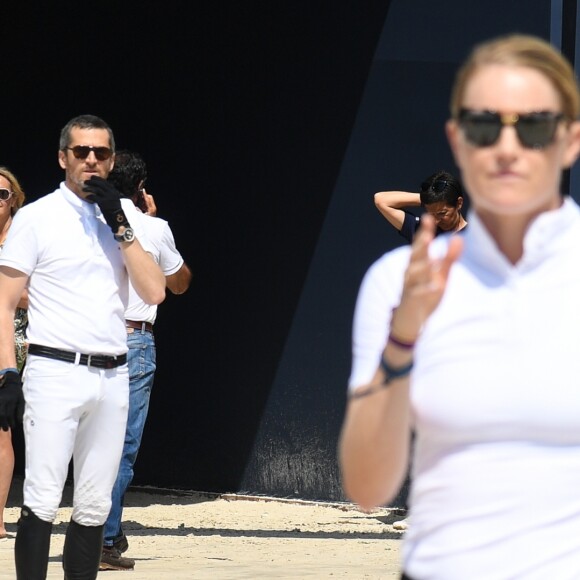 Guillaume Canet troisième sur le podium du PRIZE FERRETTI YACHTS - Pour la cinquième année consécutive, le Longines Athina Onassis Horse Show ("LAOHS"), s'installe sur la mythique plage de Pampelonne, située sur la Presqu'île de Saint-Tropez. Cet évènement d'exception est orchestré par la célèbre cavalière Athina Onassis. Le 31 mai 2018. © Lionel Urman / Bestimage