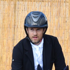 Guillaume Canet troisième sur le podium du PRIZE FERRETTI YACHTS - Pour la cinquième année consécutive, le Longines Athina Onassis Horse Show ("LAOHS"), s'installe sur la mythique plage de Pampelonne, située sur la Presqu'île de Saint-Tropez. Cet évènement d'exception est orchestré par la célèbre cavalière Athina Onassis. Le 31 mai 2018. © Lionel Urman / Bestimage