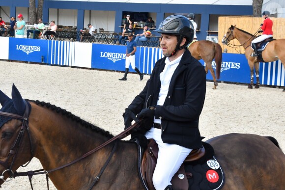 Guillaume Canet troisième sur le podium du PRIZE FERRETTI YACHTS - Pour la cinquième année consécutive, le Longines Athina Onassis Horse Show ("LAOHS"), s'installe sur la mythique plage de Pampelonne, située sur la Presqu'île de Saint-Tropez. Cet évènement d'exception est orchestré par la célèbre cavalière Athina Onassis. Le 31 mai 2018. © Lionel Urman / Bestimage