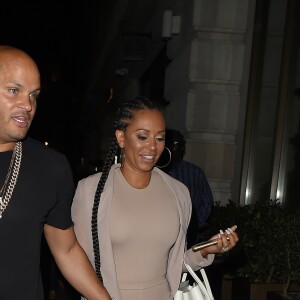 Melanie Brown (Mel B) et son mari Stephen Belafonte sortent du restaurant "Novikov", situé dans le quartier de Mayfair à Londres, le 12 mai 2016.