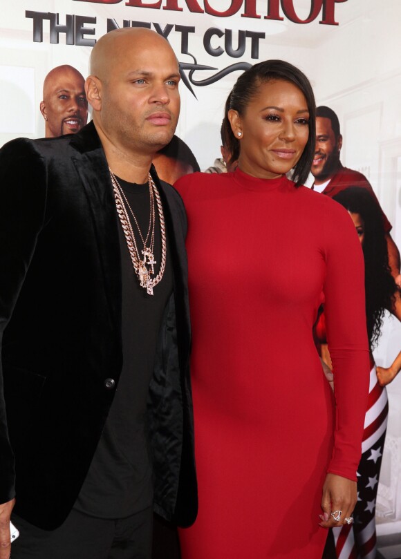 Melanie Brown (Mel B) et son mari Stephen Belafonte lors de la première de "BarberShop: The Next Cut" à Hollywood, le 6 avril 2016.