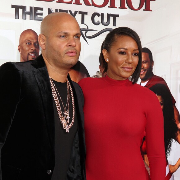 Melanie Brown (Mel B) et son mari Stephen Belafonte lors de la première de "BarberShop: The Next Cut" à Hollywood, le 6 avril 2016.