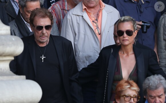 Johnny et Laeticia Hallyday aux obsèques de Mireille Darc en l'église Saint-Sulpice à Paris. Le 1er septembre 2017.