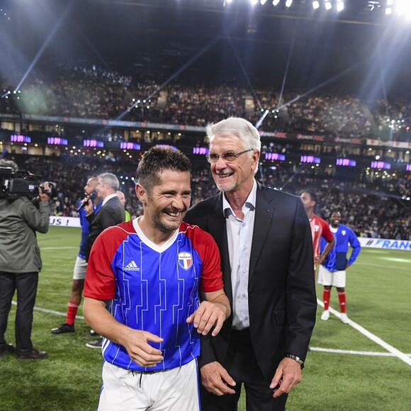 Bixente Lizarazu et Aimé Jacquet - Les Bleus de France98 se sont imposés (3-2) face à une sélection FIFA 98 pour le match des légendes pour l'anniversaire des 20 ans du sacre mondial à la U Arena à Nanterre, France, le 12 juin 2018. © Bestimage