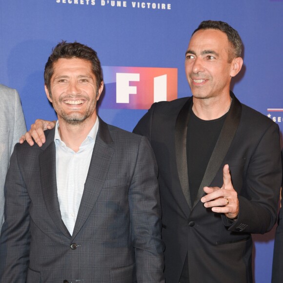 Bixente Lizarazu et Youri Djorkaeff à la première du documentaire "98 Secrets d'une Victoire" au cinéma Gaumont Champs-Elysées Marignan à Paris, le 30 mai 2018. © Guirec Coadic/Bestimage Ce