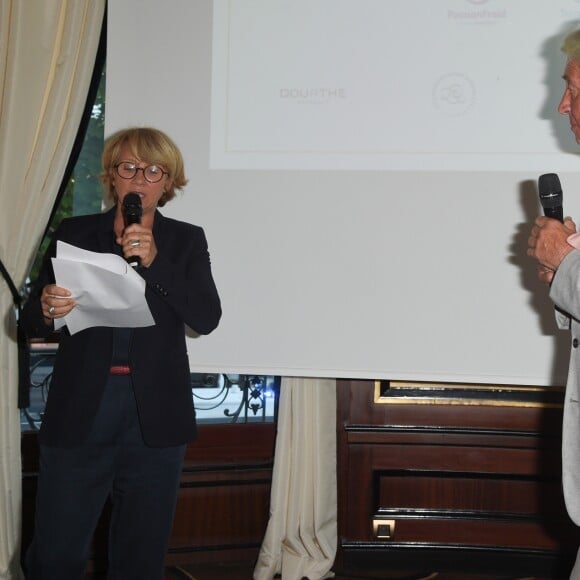 Semi-exclusif - Ariane Massenet et Pierre Cornette de Saint-Cyr - Vente aux enchères "Les Vendanges Solidaires Barriére" au Fouquet's, Hôtel Barrière à Paris le 18 juin 2018. © Coadic Guirec/Bestimage