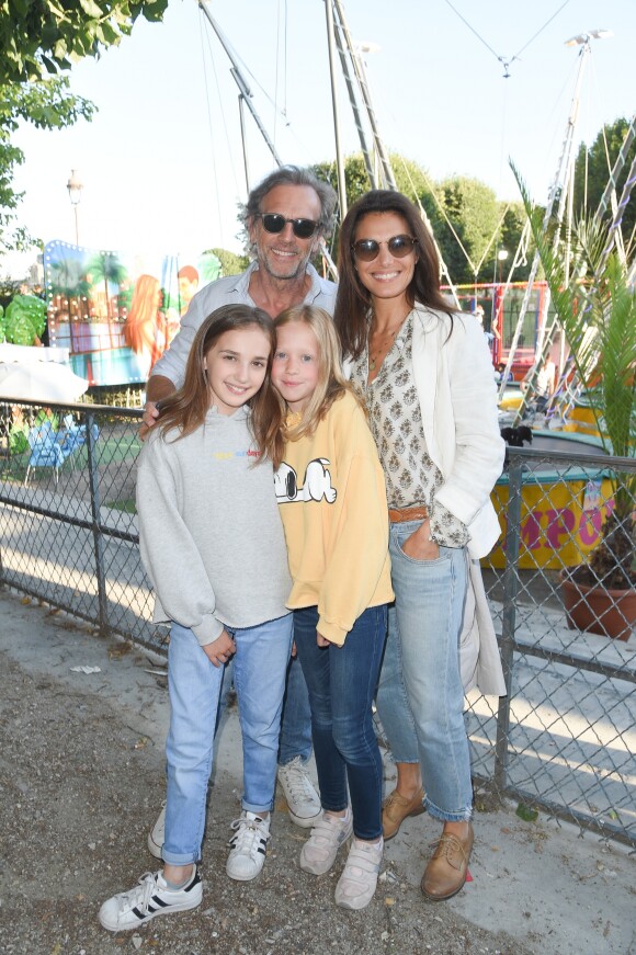 Stéphane Freiss, sa femme Ursula Freiss et leur fille Bianca, guest - Soirée d'inauguration de la 35ème fête foraine des Tuileries au Jardin des Tuileries à Paris, le 22 juin 2018. © Coadic Guirec/Baldini/Bestimage  People attend the "Fete des Tuileries" on June 22nd, 2018 in Paris, France.22/06/2018 - Paris