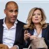 Exclusif - Valérie Trierweiler et son nouveau compagnon Romain Magellan (ex-star du rugby) s'embrassent dans les tribunes de la finale du Top 14 français entre Montpellier et Castres au Stade de France à Paris, le 2 juin 2018. © Pierre Perusseau/Bestimage