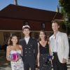 Le prince Nikolai de Danemark a pu compter le 27 juin 2018 sur la présence de son père le prince Joachim, sa mère la comtesse Alexandra de Frederiksborg (robe blanche) et sa belle-mère la princesse Marie de Danemark (robe noire) lors de sa cérémonie de remise de diplôme à l'école privée d'Herlufsholm.