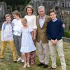 Le roi Philippe et la reine Mathilde de Belgique se sont prêtés avec leurs quatre enfants, Elisabeth, Gabriel, Emmanuel et Eléonore, au jeu de la séance photo des vacances d'été devant les photographes de presse le 24 juin 2018 à l'occasion d'une visite des ruines de l'abbaye de Villers-la-Ville.