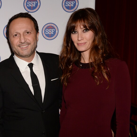 Exclusif - Arthur (Jacques Essebag) et sa compagne Mareva Galanter - Dîner de gala et vente aux enchère pour l'association "Sauveteurs sans frontières" ("Qui sauve une vie sauve l'humanité") à l'hôtel du collectionneur à Paris, France, le 13 février 2018. © Rachid Bellak/Bestimage