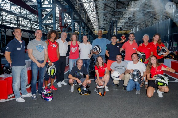 Exclusif - Les participants du tournoi: Laurent Maistret, Jean Réveillon, Magali Le Floc'h, Satya Oblet (Oblette), Roland Gilles, les ambassadrices MCC de Cholet - Tournoi de karting dans le cadre de l'étape du coeur au profit de "Mécénat Chirurgie Cardiaque (MCC)" à l'autre usine à Cholet le 8 juillet 2018. © CVS/Bestimage