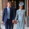 Pippa Middleton, enceinte, et son mari James Matthews au baptême du prince Louis de Cambridge, troisième enfant du prince William et de la duchesse Catherine, le 9 juillet 2018 en la chapelle royale du palais St James à Londres.