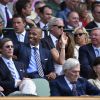 Thierry Henry et sa compagne enceinte Andrea Rajacic lors des demi-finales hommes du tournoi de Wimbledon au All England Lawn Tennis and Croquet Club, à Londres le 10 juillet 2015