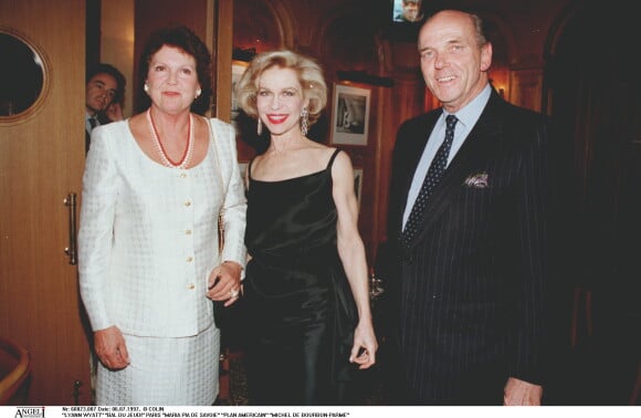 Le prince Michel de Bourbon-Parme et la princesse Maria Pia de Savoie en juillet 1997 à Paris avec Lyann Wyatt.