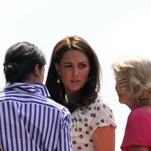 La duchesse Catherine de Cambridge (Kate Middleton) et la duchesse Meghan de Sussex (Meghan Markle) arrivant à Wimbledon le 14 juillet 2018, quelques dizaines de minutes avant le début de la finale dames opposant Serena Williams et Angelique Kerber.