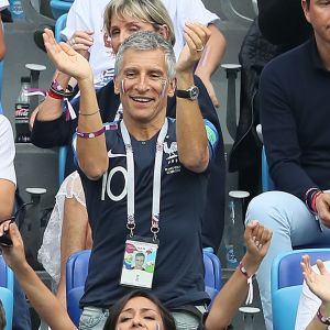Leïla Kaddour-Boudadi, Nagui dans les tribunes lors du match de quart de finale de la Coupe du Monde Russia2018 "France - Uruguay (FIFA World Cup Russia2018)" au stade Nijni Novgorod. La France a gagné 2-0 et rencontrera la Belgique en demi-finale. Russie, le 6 juillet 2018. © Cyril Moreau/Bestimage
