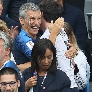 Nagui et Dylan Deschamps dans les tribunes lors du match de quart de finale de la Coupe du Monde Russia2018 "France - Uruguay (FIFA World Cup Russia2018)" au stade Nijni Novgorod. La France a gagné 2-0 et rencontrera la Belgique en demi-finale. Russie, le 6 juillet 2018. © Cyril Moreau/Bestimage