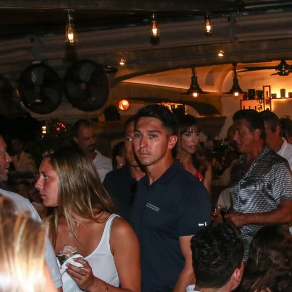 Sylvester Stallone a dîné dans la pizzeria Marcellino avec sa femme Jennifer Flavin et ses trois filles Sistine, Sophia et Scarlet avant de rejoindre son yacht sur le port de Saint-Tropez le 12 juillet 2018.