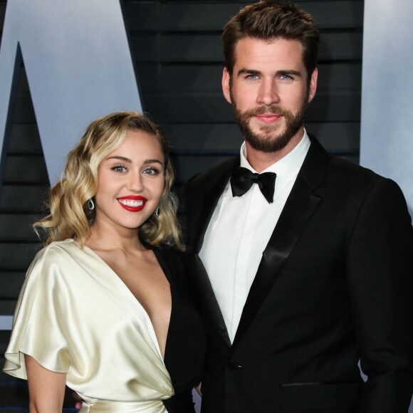 Miley Cyrus et son compagnon Liam Hemsworth à la soirée Vanity Fair Oscar au Wallis Annenberg Center à Beverly Hills, le 4 mars 2018