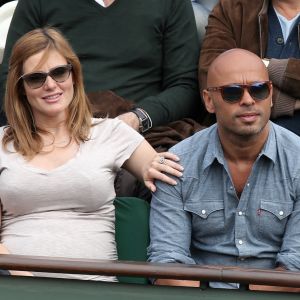 Eric Judor et sa compagne (enceinte) aux Internationaux de France de tennis de Roland Garros à Paris, le 29 mai 2014.