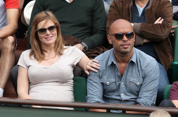 Eric Judor et sa compagne (enceinte) aux Internationaux de France de tennis de Roland Garros à Paris, le 29 mai 2014.