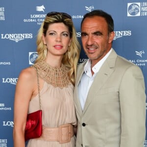 Exclusif - Nikos Aliagas et sa compagne Tina Grigoriou - Photocall lors du Longines Paris Eiffel Jumping au Champ de Mars à Paris, le 7 juillet 2018. © Perusseau-Veeren/Bestimage