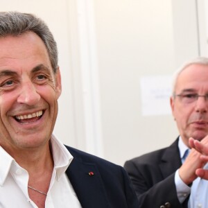 Exclusif - Nicolas Sarkozy, Jean Leonetti, le maire d'Antibes et Carla Bruni-Sarkozy dans les coulisses du 58e festival "Jazz à Juan" à Juan-les-Pins le 17 juillet 2018. © Bruno Bebert/Bestimage