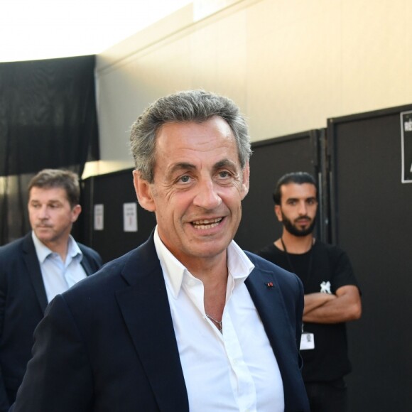 Exclusif - Nicolas Sarkozy, Jean Leonetti, le maire d'Antibes et Carla Bruni-Sarkozy dans les coulisses du 58e festival "Jazz à Juan" à Juan-les-Pins le 17 juillet 2018. © Bruno Bebert/Bestimage