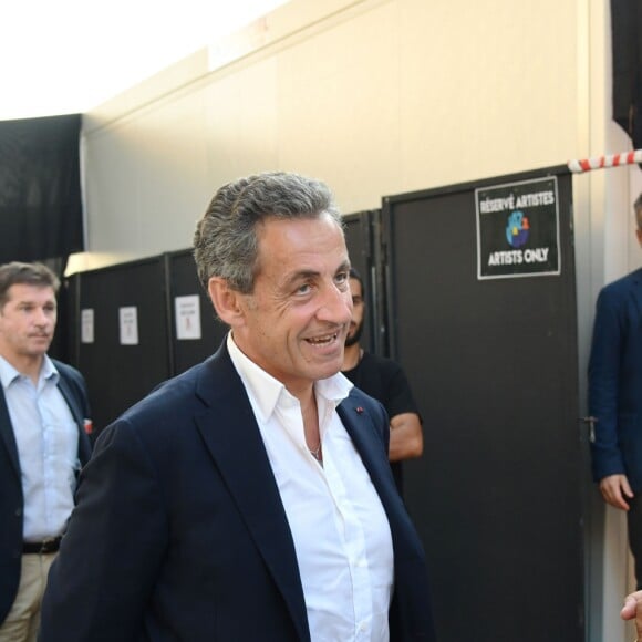 Exclusif - Nicolas Sarkozy, Jean Leonetti, le maire d'Antibes et Carla Bruni-Sarkozy dans les coulisses du 58e festival "Jazz à Juan" à Juan-les-Pins le 17 juillet 2018. © Bruno Bebert/Bestimage