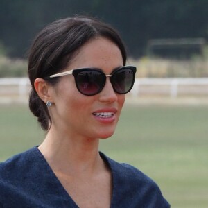 Le prince Harry, duc de Sussex et Meghan Markle, la Duchesse de Sussex arrivent à la Royal Berkshire Polo Cup où le Duc participe aujourd'hui à la Coupe ISP Hanz de Sentebale à Windsor au Royaume-Uni, le 26 juillet 2018.