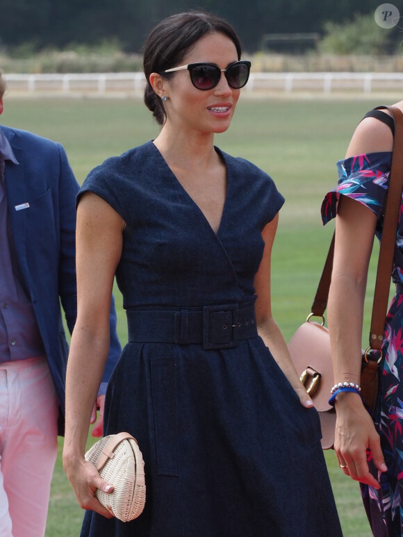 Le prince Harry, duc de Sussex et Meghan Markle, la Duchesse de Sussex arrivent à la Royal Berkshire Polo Cup où le Duc participe aujourd'hui à la Coupe ISP Hanz de Sentebale à Windsor au Royaume-Uni, le 26 juillet 2018.