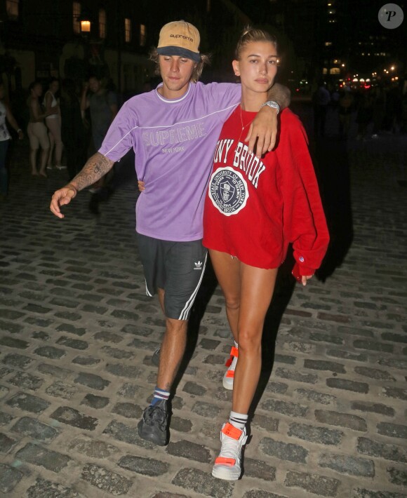 Justin Bieber et sa fiancée Hailey Baldwin quittent le théâtre iPiC dans le quartier de South Side Seaport à New York, le 26 juillet 2018.