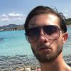 Tarek Benattia à la plage en Sardaigne - Instagram, 11 juillet 2018