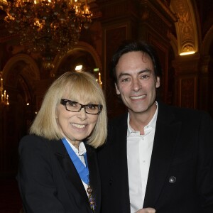 Exclusif - Prix spécial - Mireille Darc et Anthony Delon - Remise de médaille d'Officier de l'Ordre National du Mérite à Yves Dahan par Mireille Darc à la mairie de Paris le 26 janvier 2016. © Coadic Guirec/Bestimage