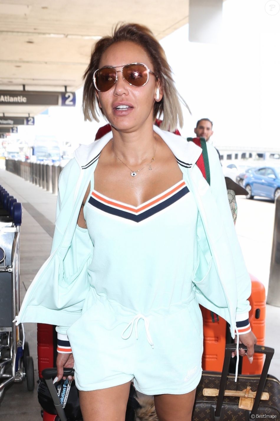 Mel B (Melanie Brown) et Gary Madatyan arrivent à l'aéroport de LAX à