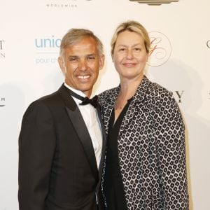 Paul Belmondo et sa femme Luana Belmondo au photocall de la 9ème édition du "Global Gift Gala" à l'hôtel Four Seasons George V à Paris, le 25 avril 2018. © Marc Ausset-Lacroix/Bestimage