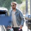 Exclusif - Ryan Gosling et sa fille sont allés chercher des pizzas à emporter à Los Angeles. Le 23 juillet 2018.
