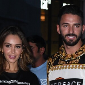 Nabilla Benattia et son compagnon Thomas Vergara - Arrivées des people au défilé Versace - Collection Prêt-à-Porter Printemps/Eté 2019" lors de la Fashion Week de Milan (MLFW) le 21 septembre 2018.