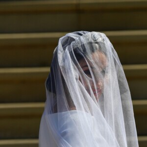 Meghan Markle, duchesse de Sussex, dans sa robe de mariée Givenchy réalisée par Clare Waight Keller, et le prince Harry lors de leur mariage à Windsor le 19 mai 2018.