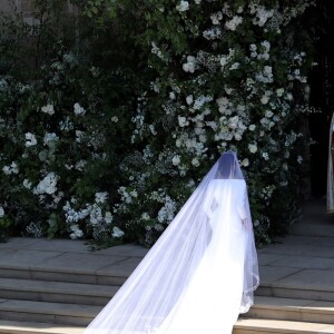 Meghan Markle, duchesse de Sussex, dans sa robe de mariée Givenchy réalisée par Clare Waight Keller, et le prince Harry lors de leur mariage à Windsor le 19 mai 2018.