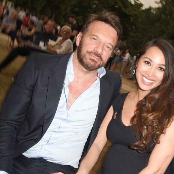 Exclusif - Samuel Le Bihan et sa compagne Angela (enceinte) - People et Backstage du Grand concert de Musique classique du 14 juillet au Champs de Mars à Paris. Le 14 juillet 2018 © Guirec-Gorassini-Veeren / Bestimage