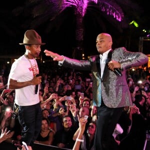 Pharrell Williams et T.I. à Miami Beach. Décembre 2013.