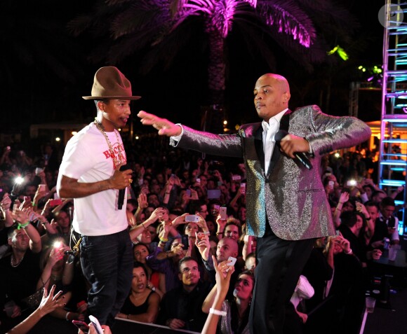 Pharrell Williams et T.I. à Miami Beach. Décembre 2013.