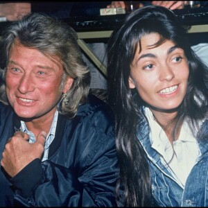 Adeline Blondieau et Johnny Hallyday à Paris, le 1er mars 1994.